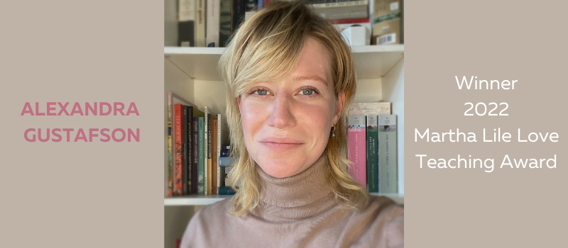 Head shot of Alexandra Gustafson, a white woman with medium-length blonde hair, standing in front of a bookshelf wearing a beige turtleneck. She is surrounded by the words "Alexandra Gustafson, Winner, 2022 Martha Lile Love Teaching Award" in pink and white.