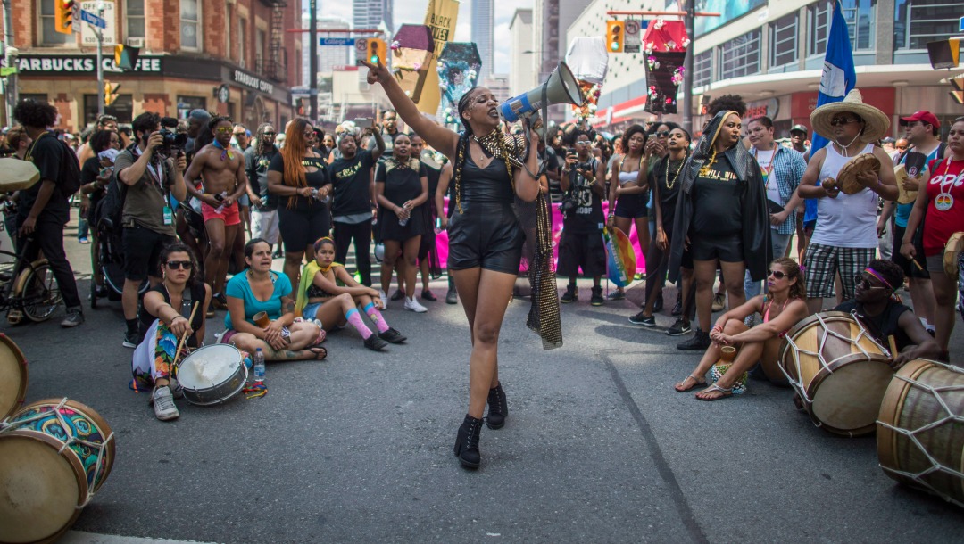 Black Lives Matter protester speaks at the 2016 Toronto Pride parade.