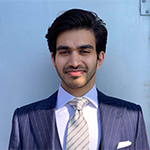 Headshot of Faisal Bhabha in a suit
