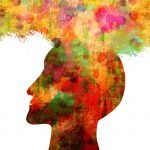 Colorful silhouette of head with equally colorful cloud emerging from its top