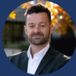 Centre image of man with short brown hair and beard wearing shirt and jacket while outside in fall. Blue banner with text including Rasmus Rosenberg Larsen and CBC Radio Ideas: Psychopathy Unmasked
