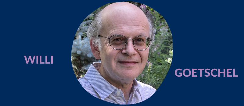 A balding older whit man with glasses and wearing a pin-striped button-down shirt standing in front of a backdrop of firs and lavender. The surrounding frame is U of T blue, with the name "Willi Goetschel" written in lilac.