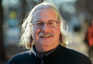 Head shot of a smiling James Conant