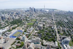 View of Toronto skyline and aerial view of St. George campus.